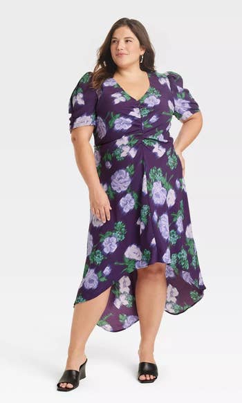 model in short sleeve v-neck purple floral dress