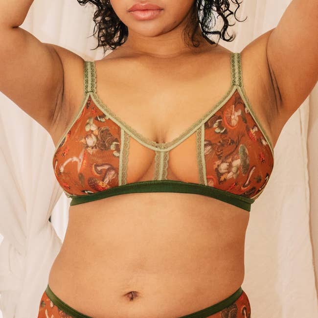 model wearing the mushroom print sheer bralette