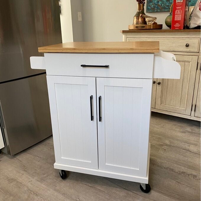 The white farmhouse-inspired cart