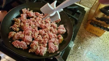 chunks of ground meat in a skillet