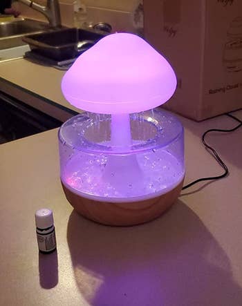 the purple-lit raining cloud essential oil diffuser