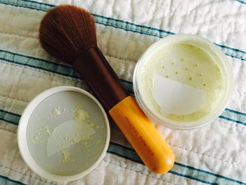 the powder next to a brush