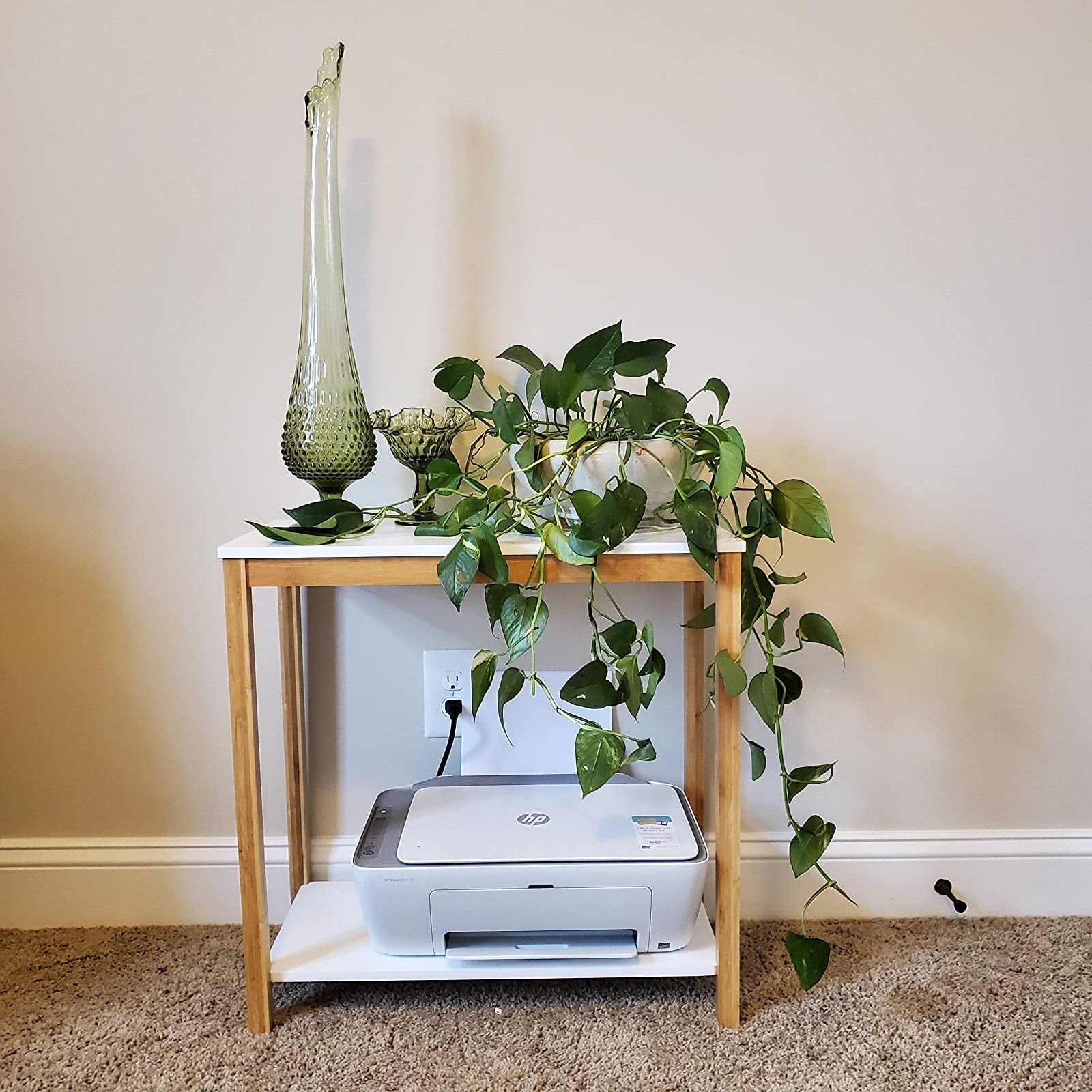 two-tier wood table with white shelves