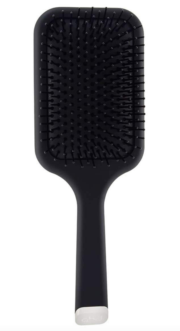 Black paddle hairbrush