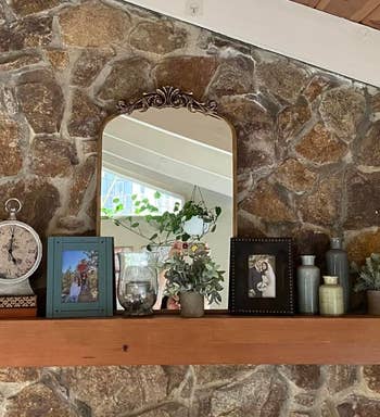 another reviewer's mirror on a fireplace mantle