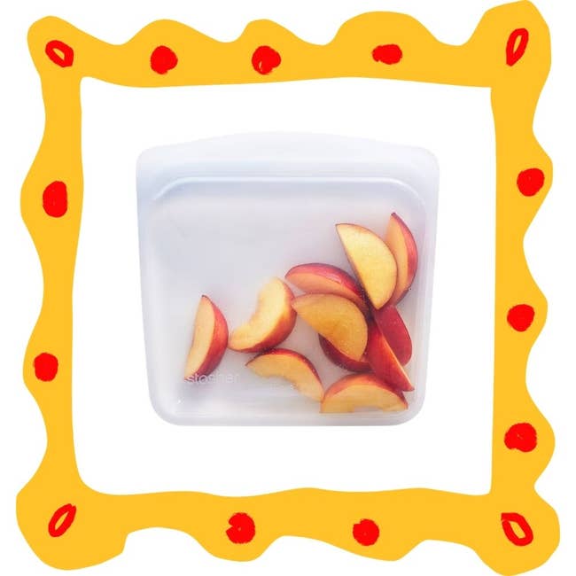 Reusable silicone storage bag filled with sliced peaches