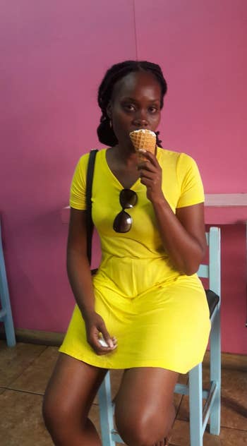 A customer review photo of the T-shirt dress in yellow