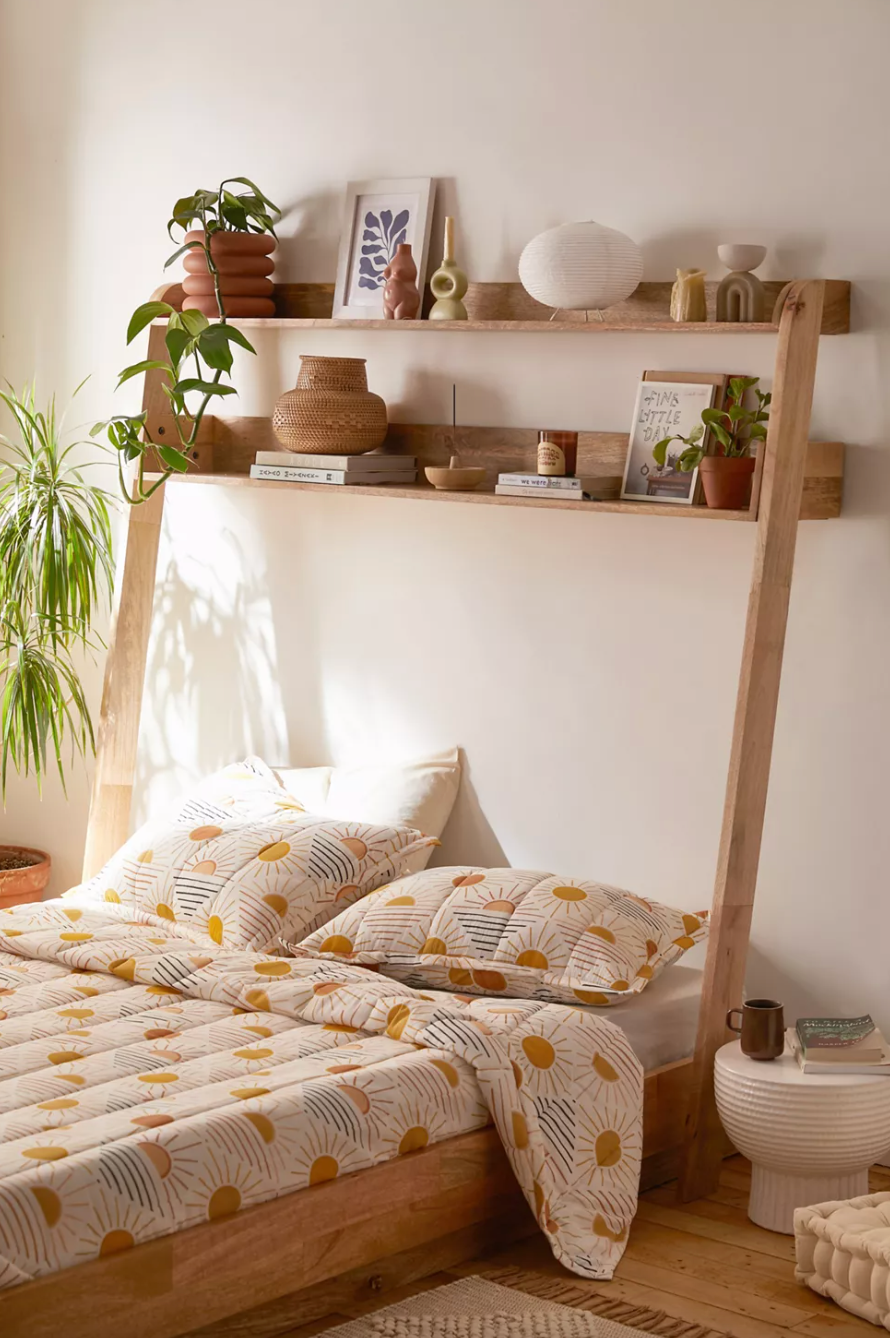 the two-shelf headboard over a queen-size bed