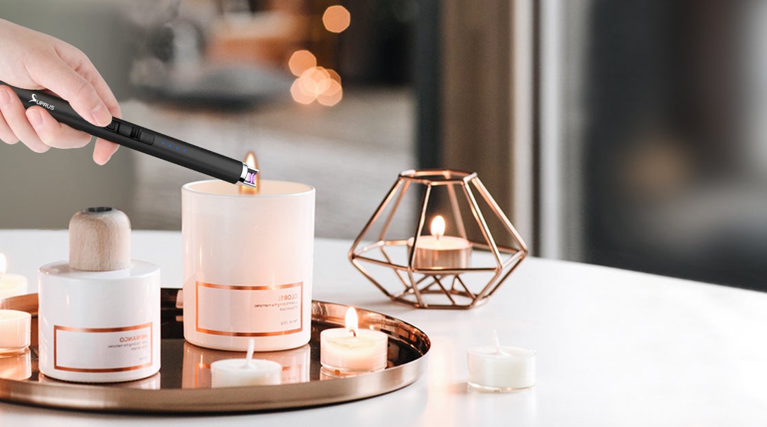 model using black electric lighter to light a candle