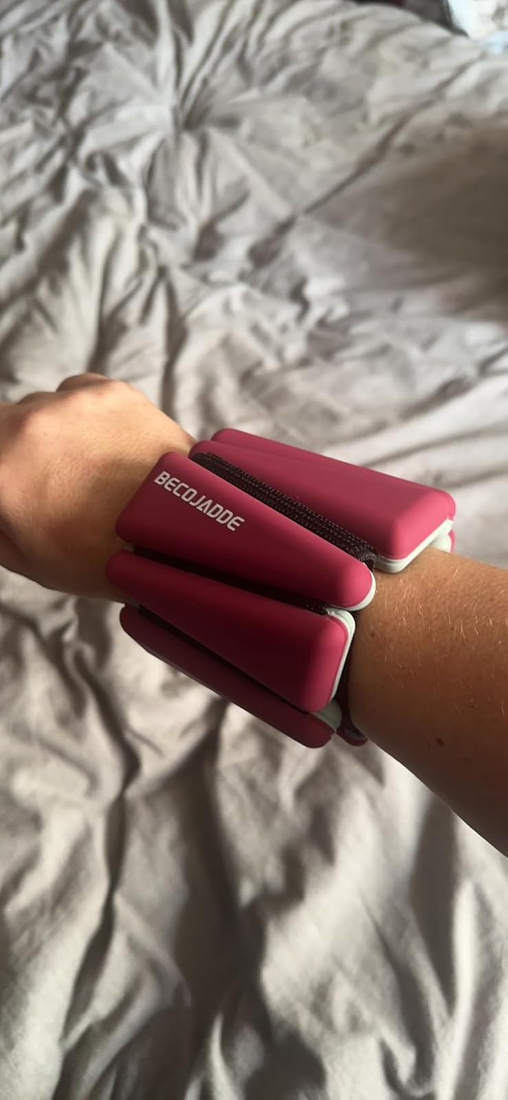 the red weight on a wrist