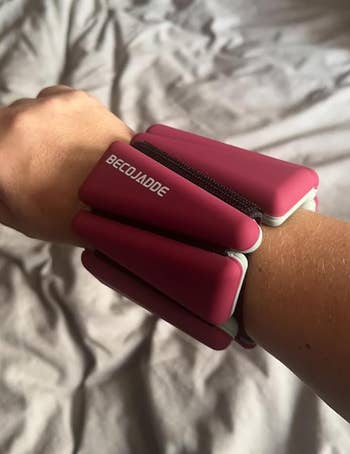 the red weight on a wrist