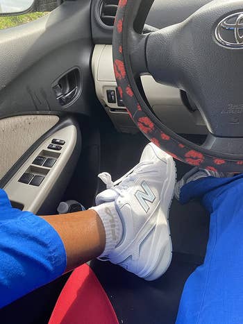 reviewer wearing the sneakers successful  white