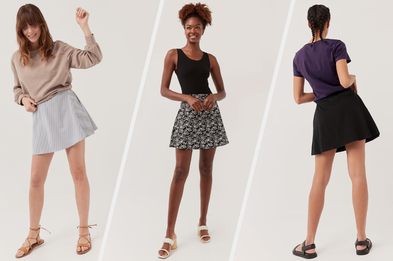 Three models wearing different colored mini skirts