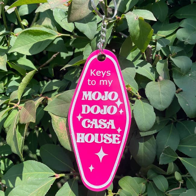 Pink keychain saying 