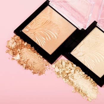 two pans of the highlight in different shades, with crushed product in front of them