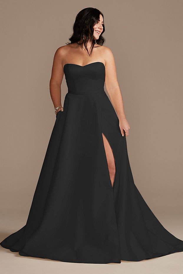 Model wearing long black wedding gown