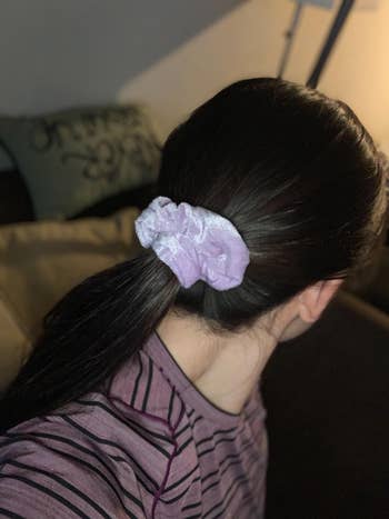 reviewer wearing lavender velvet scrunchie