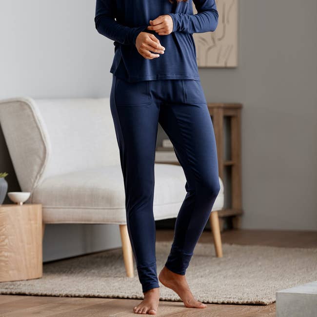 a model in blue stretchy joggers