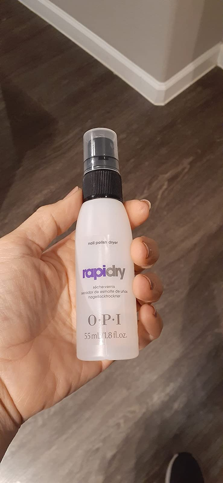 image of reviewer holding spray bottle