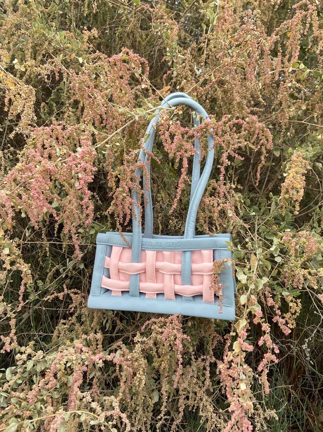 pastel basket weave purse in grass
