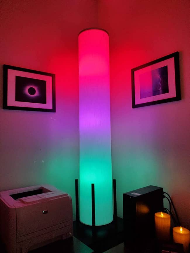 reviewer image of a standing lamp emanating different color light