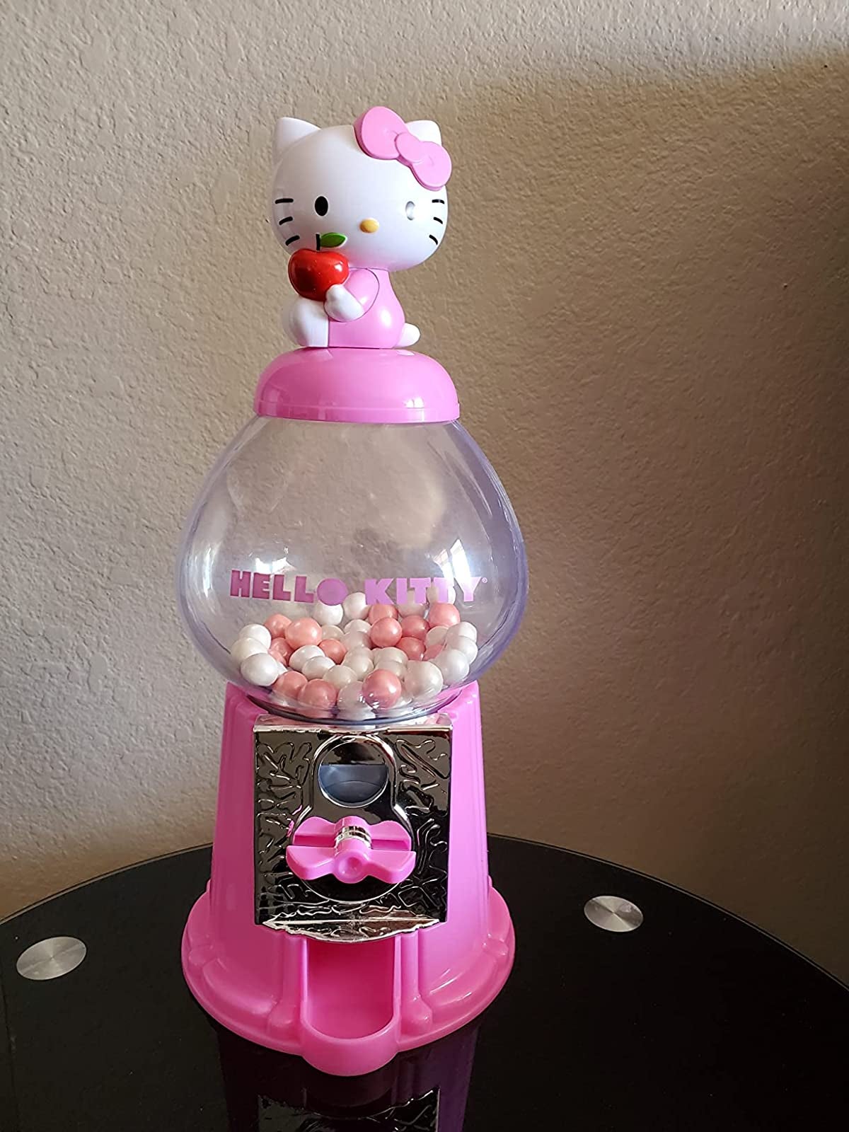 Reviewer photo of the pink gum ball dispenser