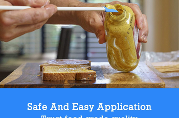 model using the spatty to get mustard out of the bottle