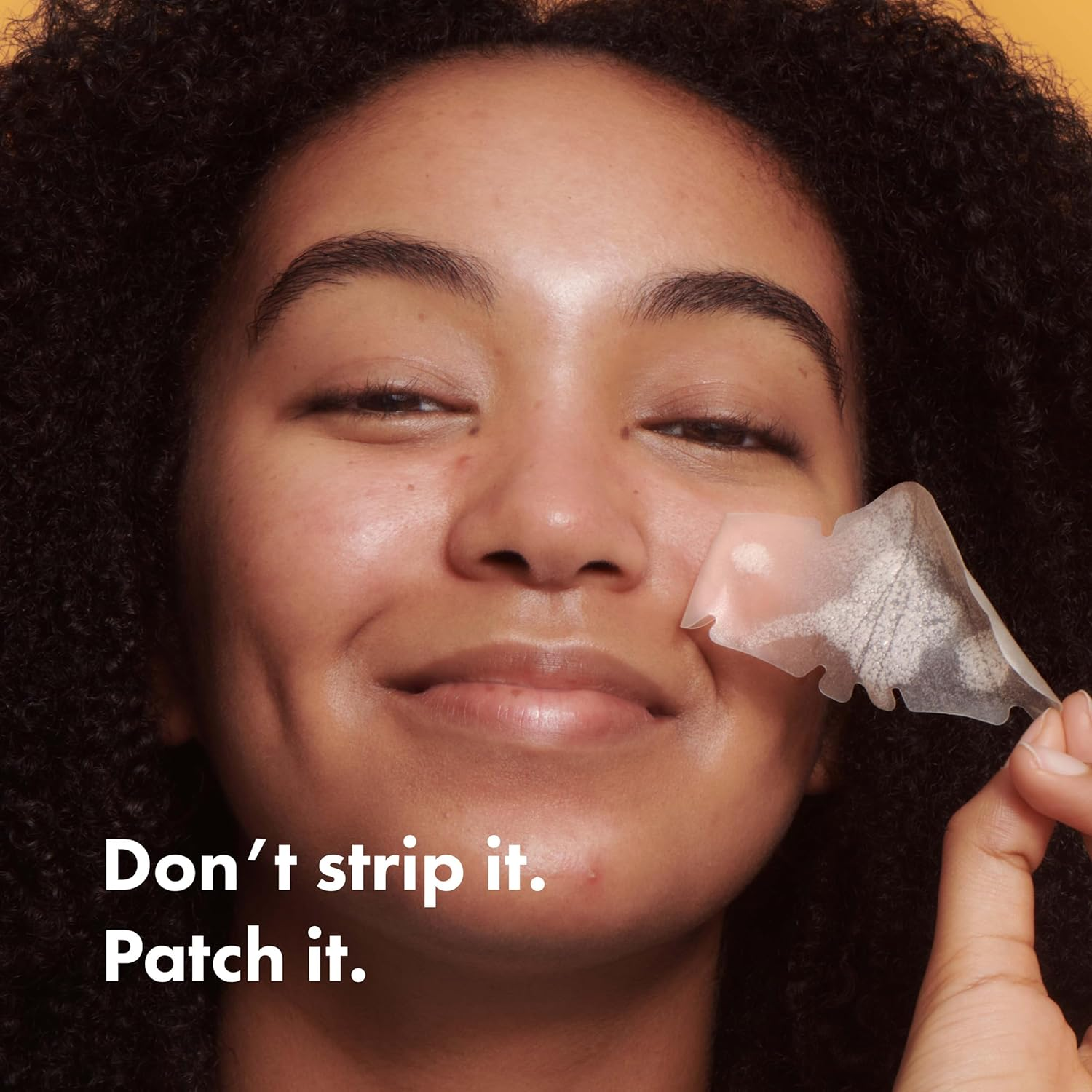 person smiling while applying a skincare patch to her face. Text reads: 