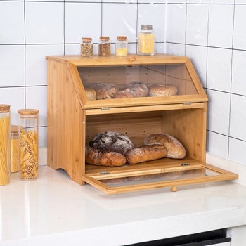 lifestyle photo of bread box full of bread