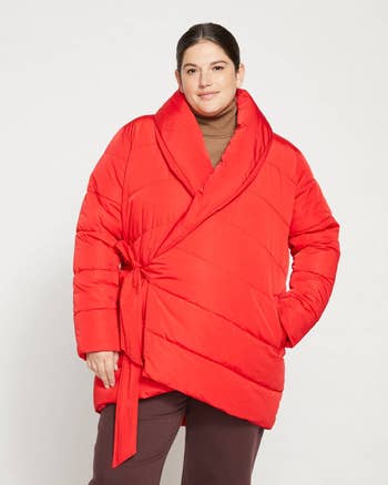model wearing the jacket in red