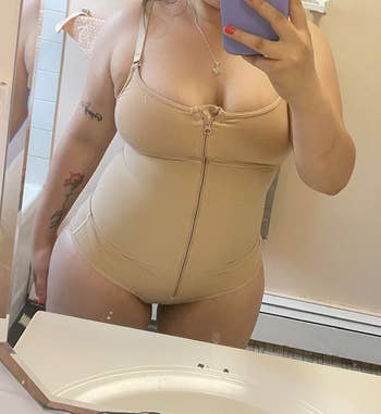 reviewer in the zippered bodysuit in the beige color