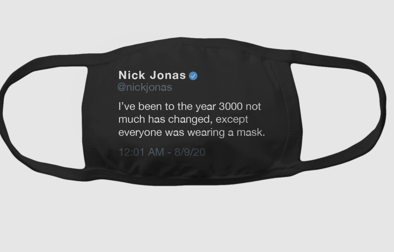 black face mask featuring a tweet from nick jonas that reads 