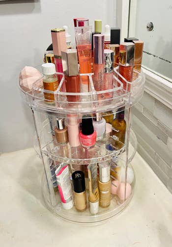 another reviewer's wide rotating organizer with assorted products connected it