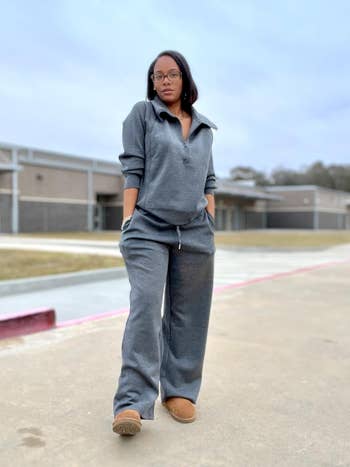 reviewer wearing gray tracksuit