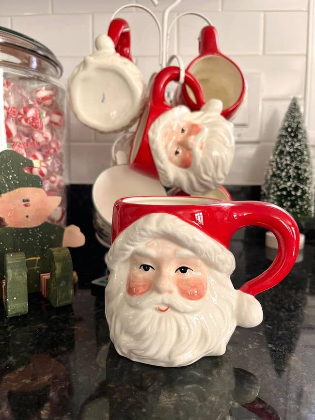 a ceramic mug shaped like santa claus