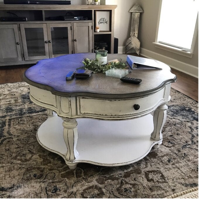 reviewer photo of round vintage style storage coffee table