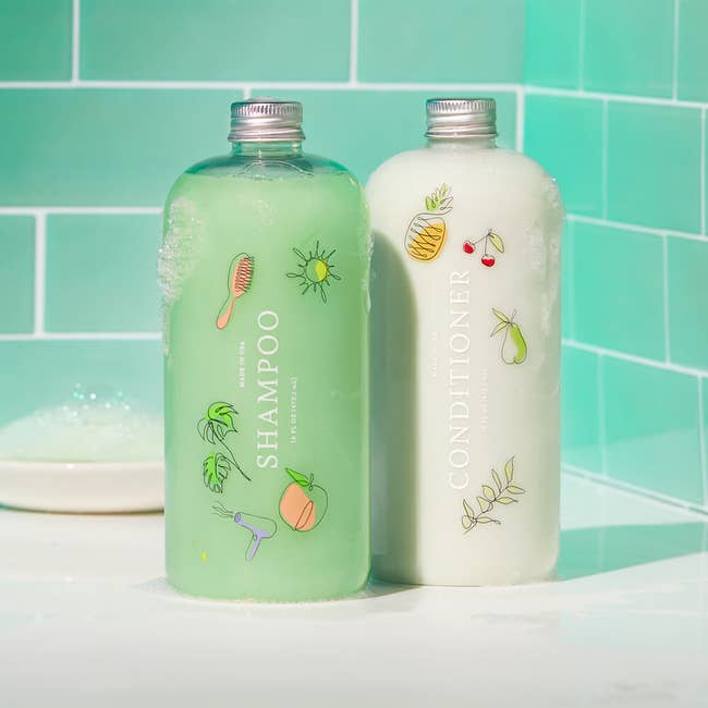 bottle of green shampoo and white conditioner