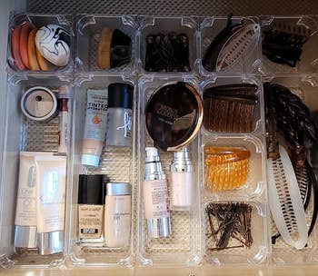 reviewers hair and beauty products organized in clear bins