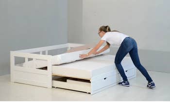 model converting the trundle bed to king bed