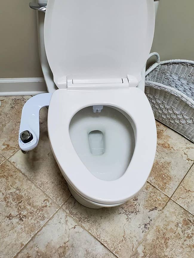 The Bio Bidet installed on a white toilet