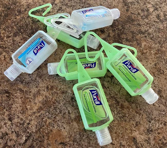 reviewer photo of the travel-size hand sanitizer bottles