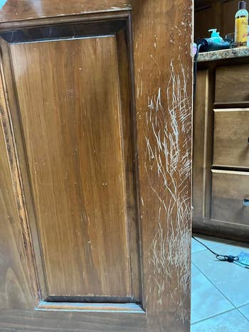 before image of wooden cabinet with scratched surface