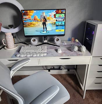 reviewer's desk setup with the keyboard and cloud wrist rest