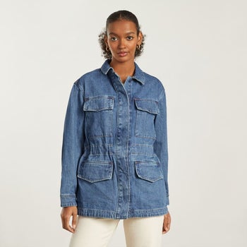 model wearing button-up denim chore jacket
