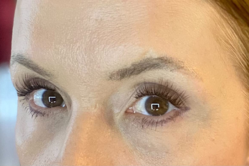 reviewer wearing the false lashes