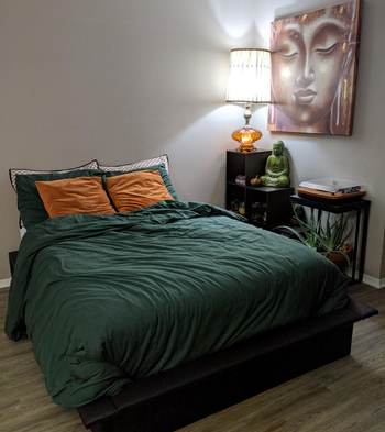 reviewer photo of black platform bed in bedroom