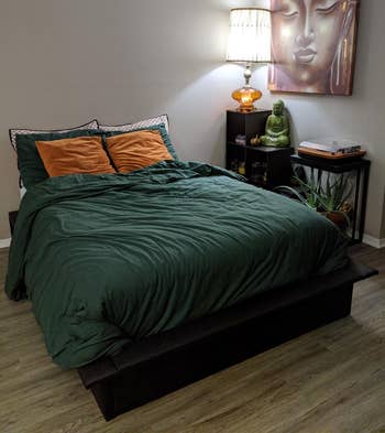 reviewer photo of black platform bed in bedroom