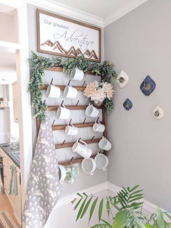 white mugs scattered on the light wood organizer