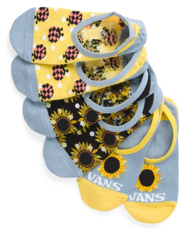 Image of three pairs of yellow and blue no-show socks