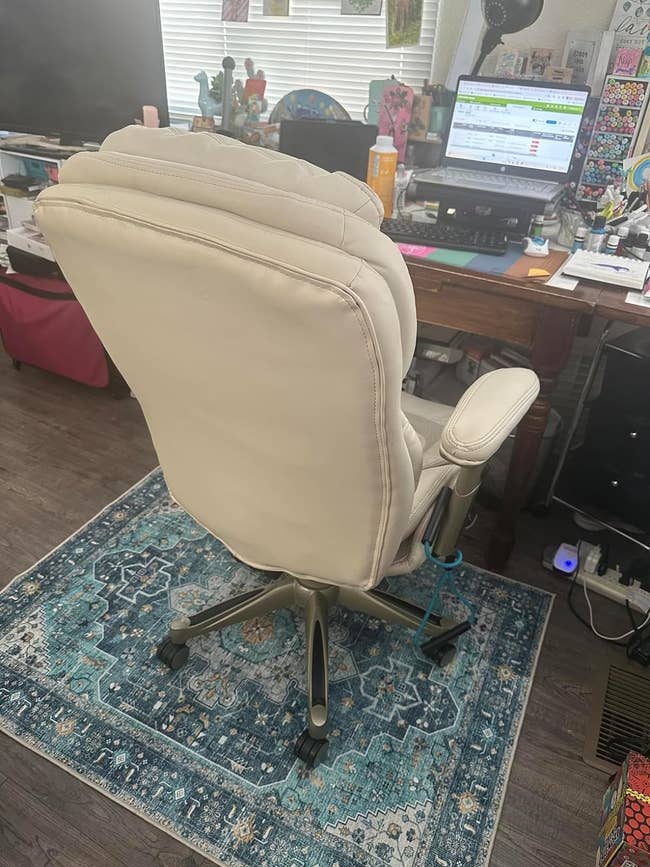 a reviewer's desk setup with the mat in a blue boho design